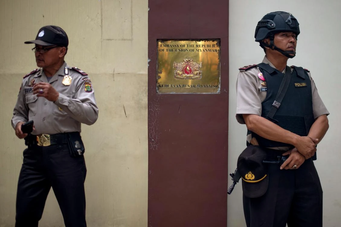 Indonesian police guard the Myanmar embassy as protesters conduct a rally in front of the embassy in Jakarta on September 2, 2017 to condemn Myanmar’s army and the government of Aung San Suu Kyi. UN chief Antonio Guterres warned on September 1 of a looming humanitarian catastrophe in western Myanmar and urged security forces to show restraint after hundreds were reported dead in communal violence and thousands continued to flee. (AFP)