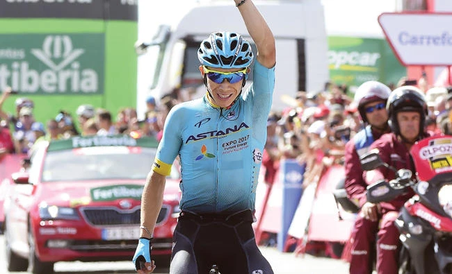 Astana Pro Team’s Colombian cyclist, Miguel Angel Lopez, celebrates as he crosses the finish line winning the 15th stage of the La Vuelta Tour of Spain cycling race on Sunday. (AFP)