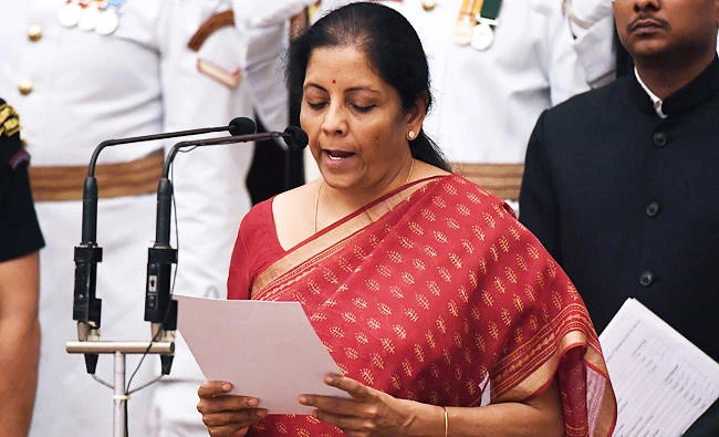 Bharatiya Janata Party (BJP) politician and member of parliament Nirmala Sitharaman takes the oath during the swearing-in ceremony of new ministers at the Presidential Palace in New Delhi on Sunday. (AFP)
