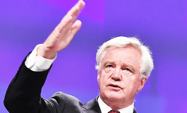 British Secretary of State for Exiting the European Union (Brexit Minister) David Davis gestures as he addresses media representatives with the EU chief Brexit negotiator at the European Union Commission Headquarters in Brussels, in this August 31, 2017 photo. (AFP)