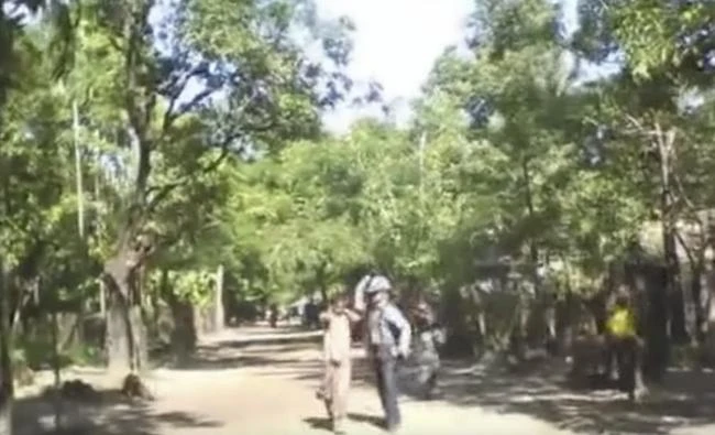 A screengrab from a BBC video shows a Myanmar soldier beating a Rohingya boy at a village in the restive state of Rakhine. BBC on Monday said it was pulling out a broadcasting deal with the Myanmar National TV because of the popular television channel's “censorship” of coverage of the Muslim Rohingya minority. (BBC video via YouTube)