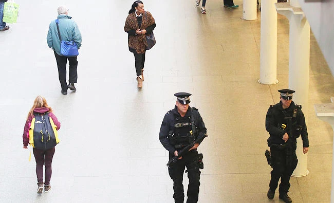 British police officers walk through St Pancras station in London, in this file photo. (Reuters)