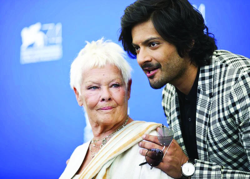 Judi Dench, left, and Ali Fazal pose during a photo call for the film ‘Victoria & Abdul’ at the 74th Venice Film Festival in Venice, Italy. (AP)