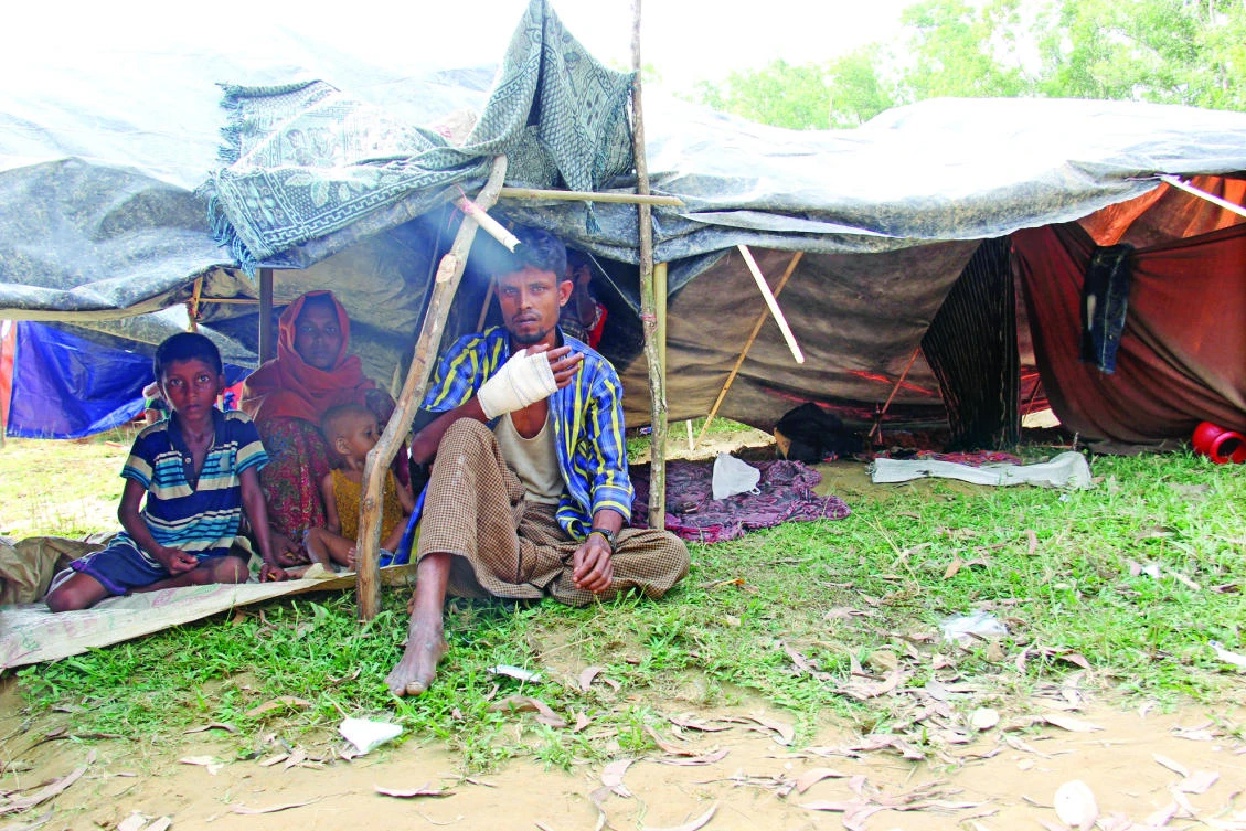 Sayed Nur, 22, a Rohingya farmer from Rakhine, was shot by the Myanmar Army while fleeing. (AN photo)