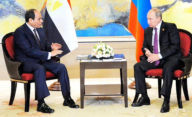 Russian President Vladimir Putin, right, and Egyptian President Abdel-Fattah el-Sissi hold a bilateral meeting on the sidelines of the BRICS Summit in Xiamen, Fujian province, China, on Monday. (AP)