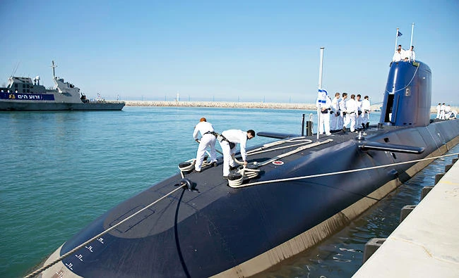 In this Jan. 12, 2016 file photo, Israeli sailors stand on a German-built "Rahav" submarine on its arrival in to the military port in Haifa, Israel. (AP)