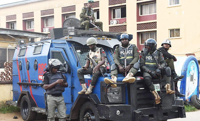Nigerian police officers take position outside a courtroom at the Lagos State High Court, in this August 30, 2017 photo. (AFP)