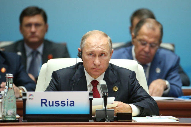 Russian President Vladimir Putin attends the 'Dialogue of Emerging Market and Developing Countries' on the sideline of the 2017 BRICS Summit in Xiamen, Fujian province, China, 05 September 2017. (REUTERS)