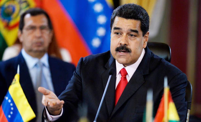 (FILES) This file photo taken on March 5, 2017 shows Venezuelan President Nicolas Maduro speaking during the Bolivarian Alliance for the Peoples of Our America (ALBA) summit at the Miraflores presidential palace in Caracas. Venezuelan President Nicolas Maduro, who is accused of dismantling his nation's democracy, will address the UN Human Rights Council in Geneva next week, a council spokesman said on September 4, 2017. / AFP / FEDERICO PARRA