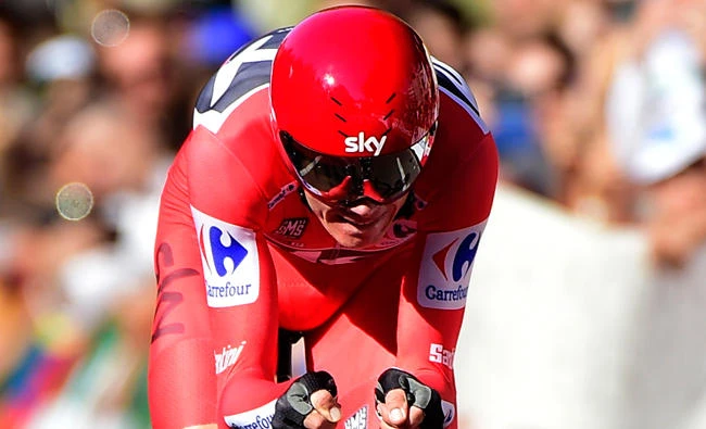 Sky's British cyclist Christopher Froome crosses the finish line to win the 16th stage of the 72nd edition of La Vuelta Tour of Spain cycling race on Tuesday. (AFP)