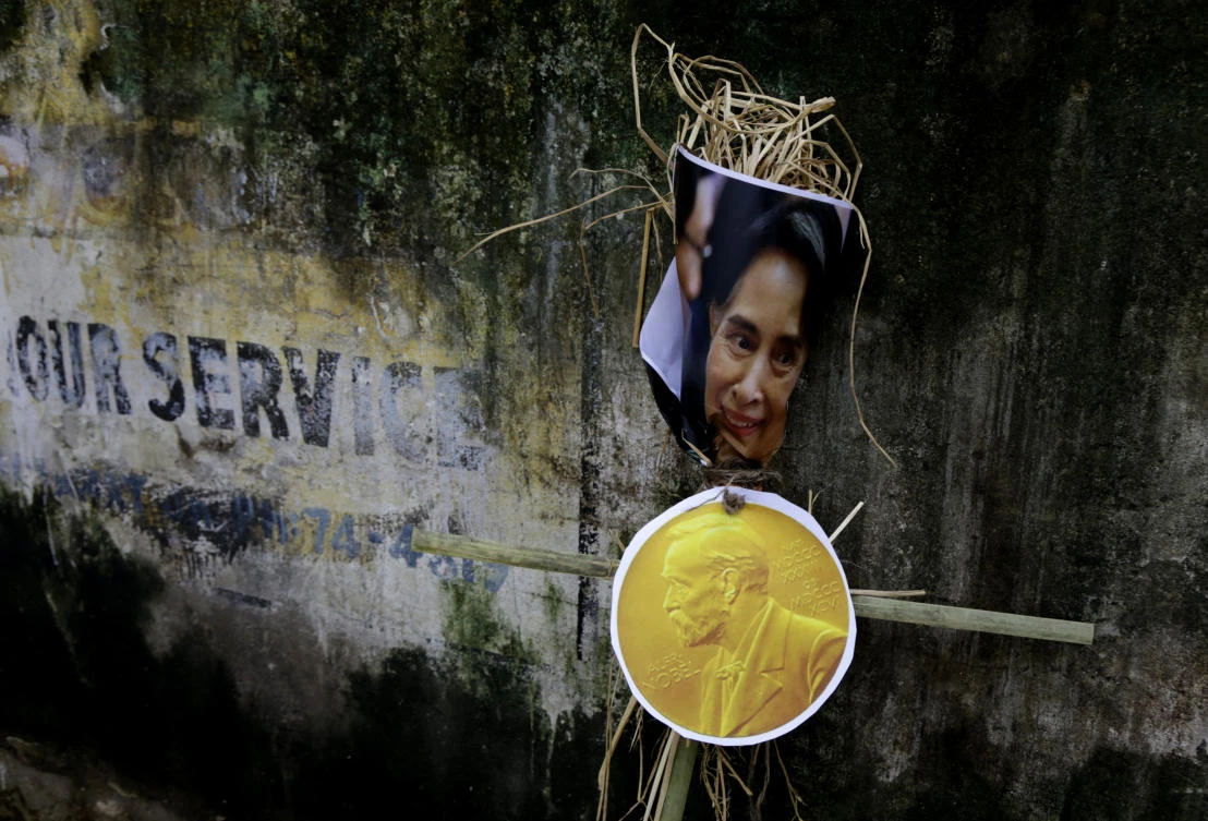 An effigy of Myanmar's State Counsellor Aung San Suu Kyi is placed against a wall before it was burnt by activists of an ultra-leftist organization during a protest against the persecution of Rohingya Muslims, near Myanmar Consulate in Kolkata, India, Monday, Sept. 4, 2017. Protestors demanded postponement of proposed visit of Indian Prime Minister Narendra Modi to Myanmar. At least 87,000 refugees from Myanmar's western Rakhine state have fled to neighboring Bangladesh since violence escalated in late August, according to the United Nations. (AP)