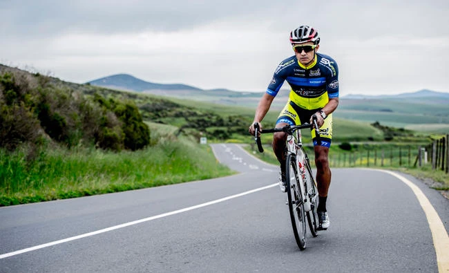 An official from the Protea Hotel rides a bike.