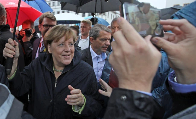 Germany’s Merkel tells voters: ‘Don’t experiment’ with the left