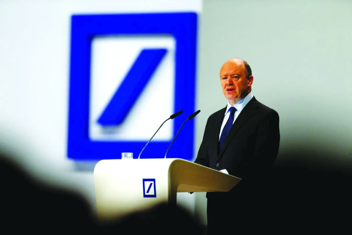John Cryan, the CEO of Deutsche Bank warned of the fallout from cheap money, cautioning against using the strong euro as a justification for printing more. (Reuters)