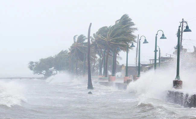 Waves crash against the seawall as Hurricane Irma slammed across islands in the northern Caribbean on Wednesday, in Fajardo, Puerto Rico on Wednesday. (REUTERS)