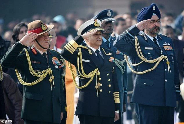 (From L) Indian Army Chief Lieutenant General Bipin Rawat, Navy Chief Admiral Sunil Lanba and Air Force Chief Air Marshal Birender Singh Dhanoa pay homage at Rajghat, the memorial of India's founding father Mahatma Gandhi, in New Delhi. (AFP)