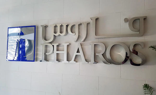 The logo of Pharos Holding for Financial Investments is seen during an interview with Reuters in Cairo, Egypt on Wednesday. (REUTERS)