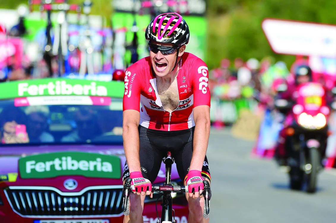 Lotto Soudal's Belgian cyclist Sander Armee celebrates as he crosses the finish line to win the 18th stage of the La Vuelta Tour of Spain cycling race on Thursday. (AFP)