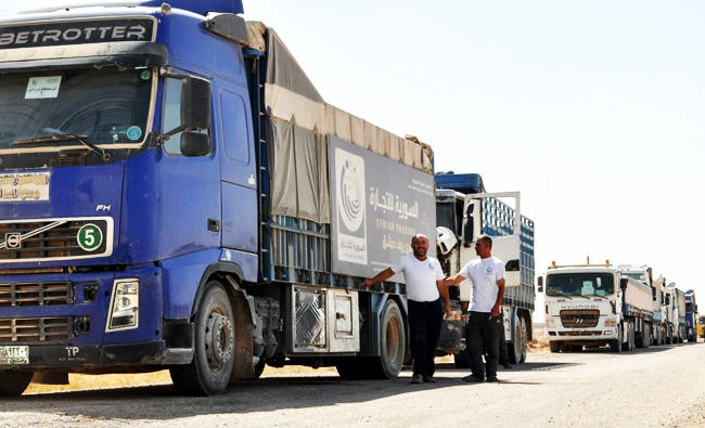 Trucks deliver first food aid to Syria’s Deir Ezzor city after siege