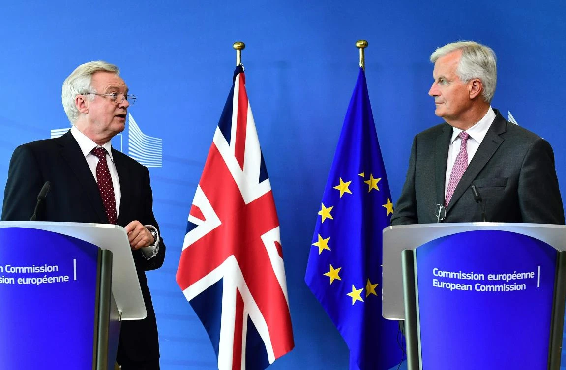 British Secretary of State for Exiting the European Union (Brexit Minister) David Davis (L) and European Union Chief Negotiator in charge of Brexit. (AFP)