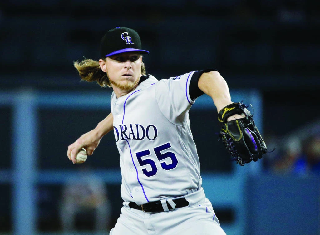 Colorado Rockies starting pitcher Jon Gray throws to a Los Angeles Dodgers batter during the first inning of a baseball game, on Thursday in Los Angeles. (AP)