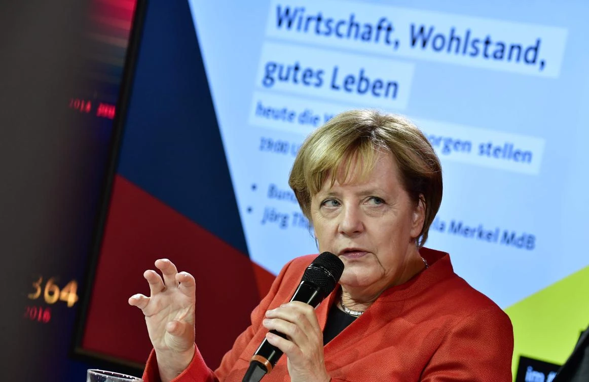 German Chancellor and conservative Christian Democratic Union (CDU) Chairwoman Angela Merkel attends an election campaign inside the walk-in campaign program in Berlin on September 9, 2017. (File photo by AFP)