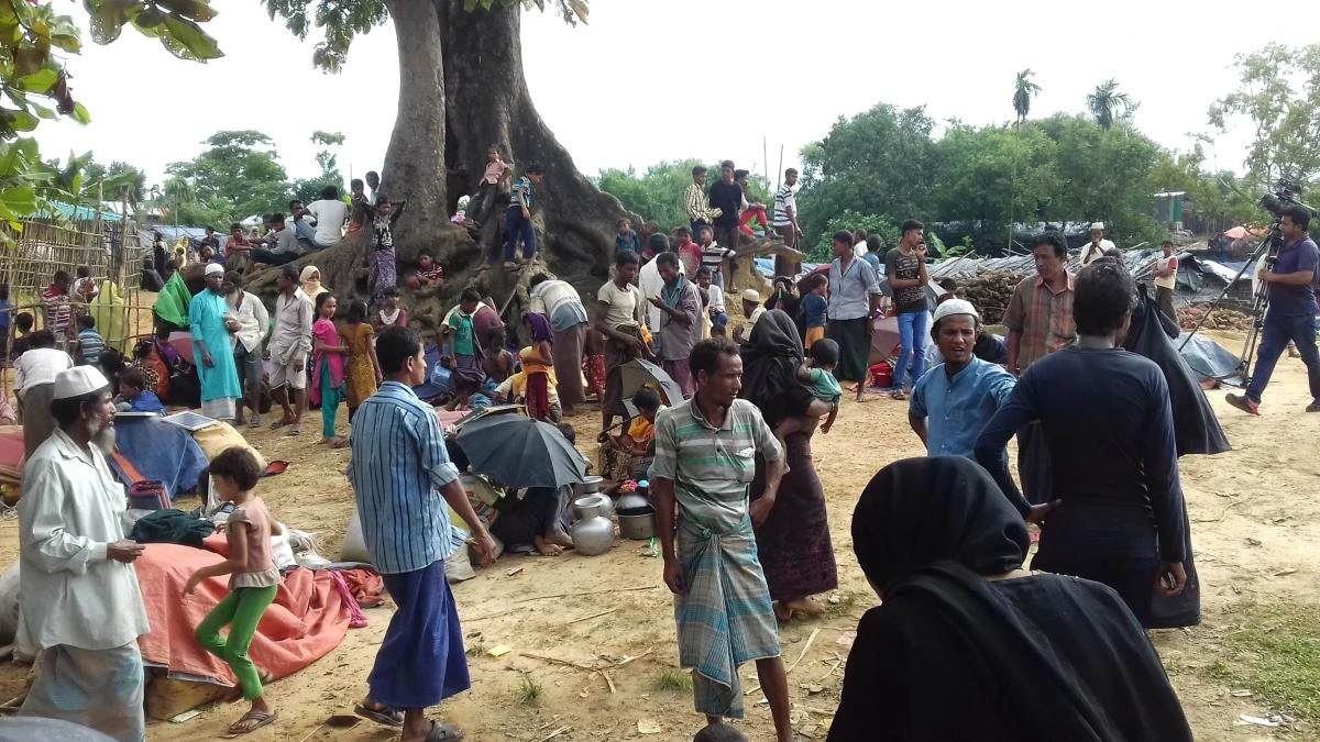 Rohingya people find refuge at Kutupalong refugee camp near the town of Ukhia in Bangladesh’s Cox’s Bazar district on August 29, 2017, after fleeing violence in Myanmar’s Rakhine state. At least 6,000 Rohingya civilians fleeing renewed violence in Myanmar are stranded near the border with Bangladesh which is blocking their entry, a senior Bangladeshi official said Tuesday, as the United Nations urged Dhaka to let them in. (AFP)