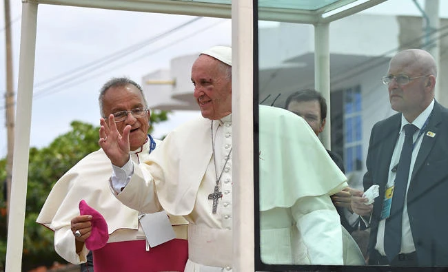 Pope injures head during Colombia procession