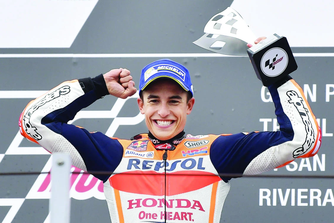 Repsol Honda Team’s Marc Marquez from Spain celebrates on the podium at the end of the San Marino Moto GP Grand Prix race at the Marco Simoncelli Circuit in Misano on Sunday. (AFP)