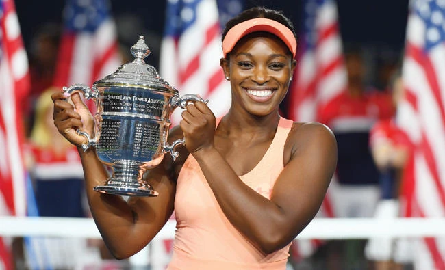 Sloane Stephens of the US celebrates with her winning trophy after defeating compatriot Madison Keys in their 2017 US Open women's singles final match at the USTA Billie Jean King National Tennis Center in New York on Saturday. (AFP)