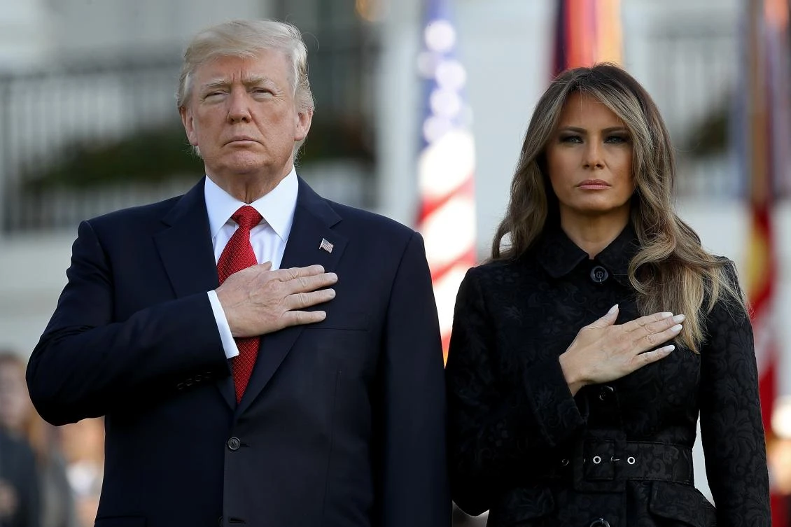 US President Donald Trump and first lady Melania Trump, observe a moment of silence on the South Lawn in Washington, DC, for the September 11 terrorist attacks, on September 11, 2017. (AFP)