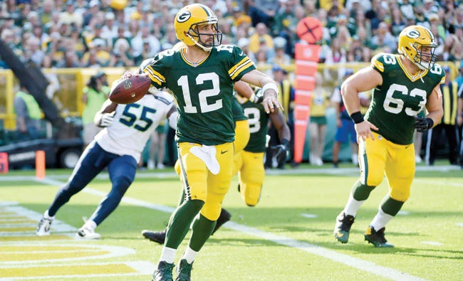 Green Bay Packers quarterback Aaron Rodgers (12) looks to pass in the second
quarter during the game against the Seattle Seahawks at Lambeau Field Sunday.
(USA TODAY Sports)