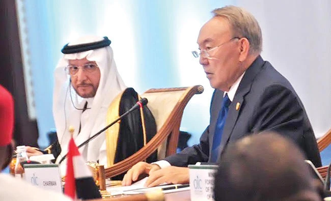 Kazakhstan President Nursultan Nazarbayev and OIC Secretary-General Yousef Al-Othaimeen speak during the 1st Islamic Summit on Science and Technology in Astana on Monday. (SPA)