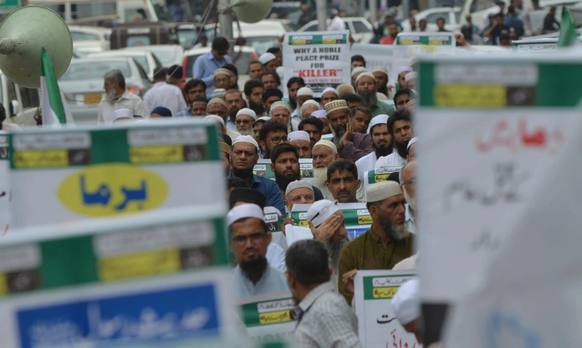 Pakistani demonstrators take part in a protest against the Myanmar government over the treatment of Rohingya Muslims in Karachi on September 11, 2017. The situation in Myanmar is a "textbook example of ethnic cleansing", the United Nations said on September 11, as the number of Rohingya Muslims fleeing Myanmar for Bangladesh topped 300,000. (AFP)