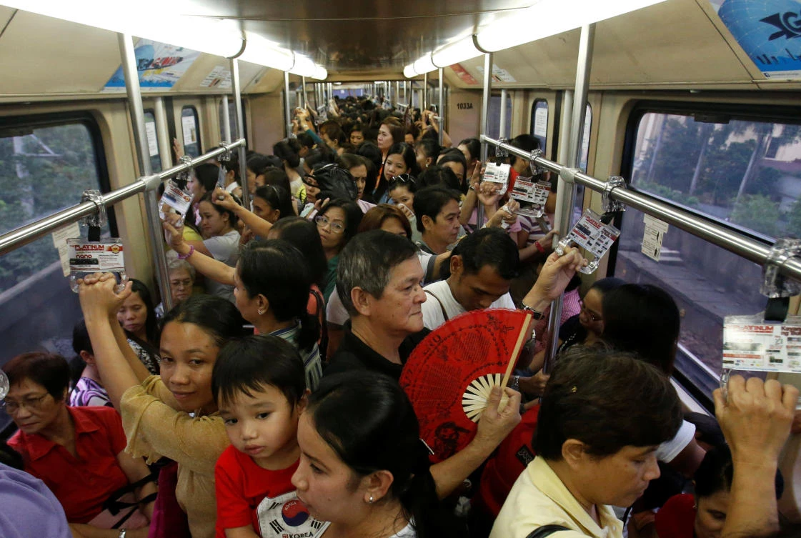 Commuters ride a train during rush hour on Southeast Asia's first light rail transit (LRT) network, which is 29-years-old, in Manila. (Reuters)