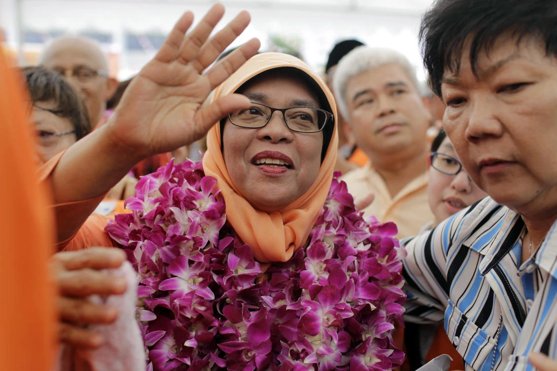 Singapore appoints first woman president