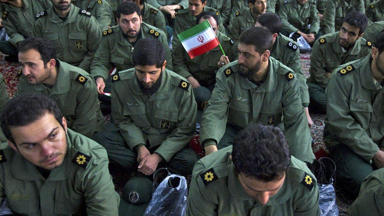 Members of the revolutionary guard attend the anniversary ceremony of Iran’s Islamic Revolution at the Khomeini shrine in the Behesht Zahra cemetery, south of Tehran, on February 1, 2012. (File photo by Reuters)