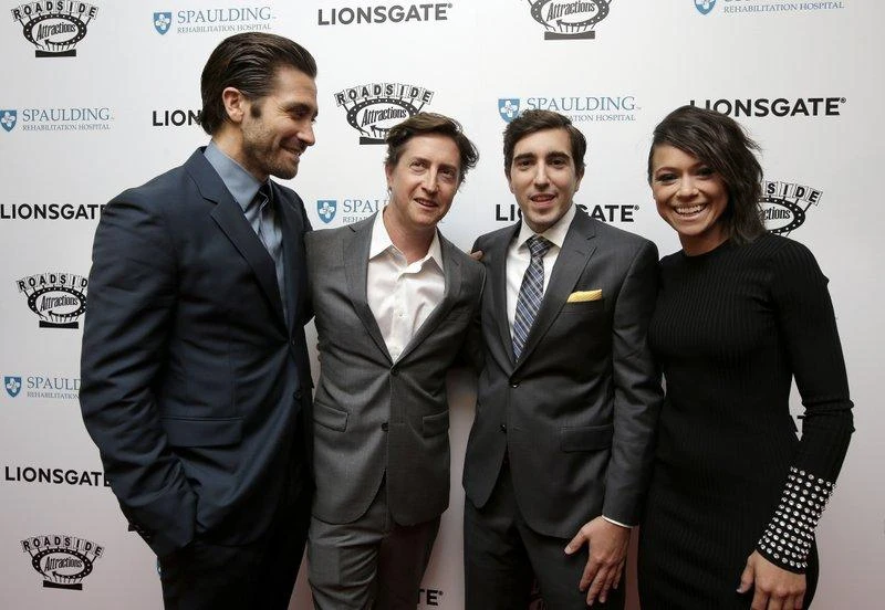 From left, actor Jake Gyllenhaal, director David Gordon Green, Boston Marathon bombing survivor Jeff Bauman, and actress Tatiana Maslany, arrive on the red carpet at the US premiere of the movie ‘Stronger.’ (AP)