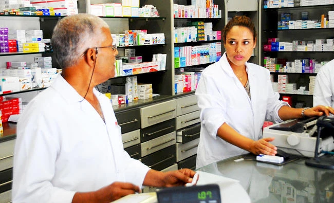 In this Sept. 7, 2017 photo, pharmacists Mokhtar Agrebi, left, and Latifa Trabelsi work in their drugstore in Tunis. (AP)