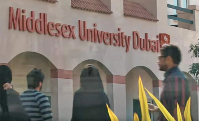 Students are seen at the entrance of the Middlesex University Dubai in this screengrab from a video posted on YouTube. (Middlesex video via YouTube)