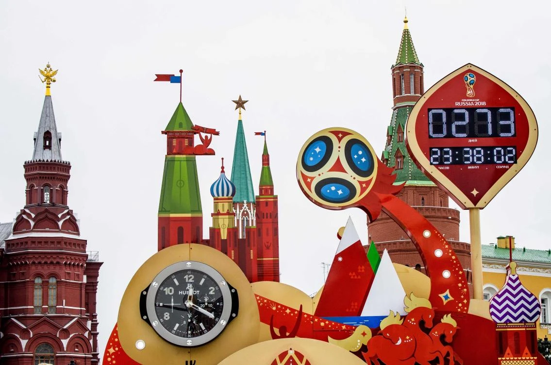 A photo taken on September 13 shows the digital FIFA World Cup 2018 countdown clock placed in front of the Red Square and the Kremlin in Moscow. AFP