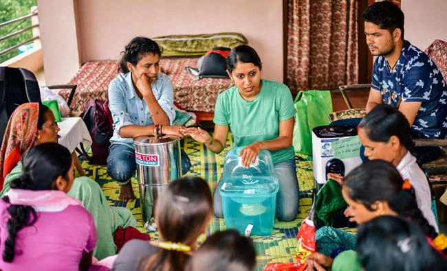 D-Lab research associate Megha Hegde along with two local students from India conducts a hands-on workshop on water filters with the women of Mujholi village in Ranikhet, Uttarakhand, India for the xylem filter technology.