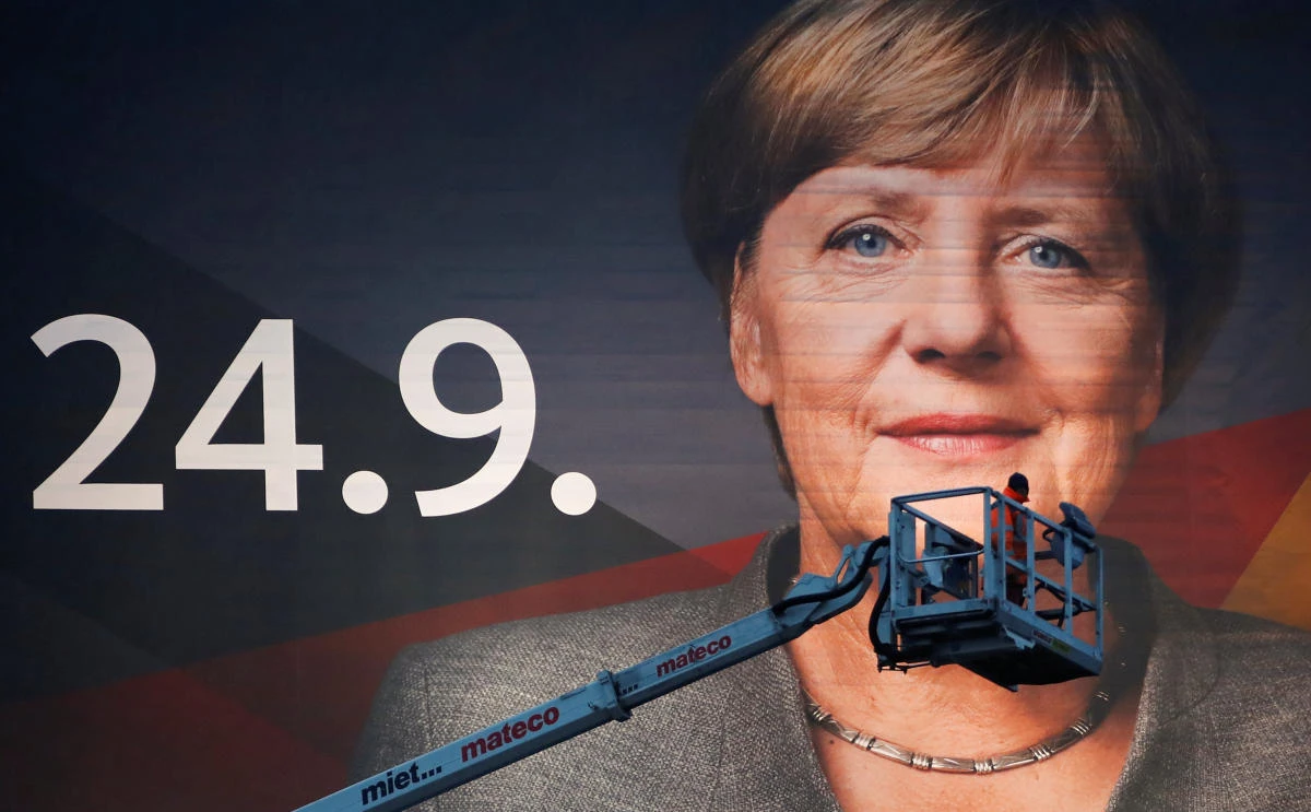 Above, Angela Merkel’s campaign poster in Duisburg. Over a third of Germans are still undecided how they will vote in the September 24 election, an opinion poll showed on Friday. (Reuters)