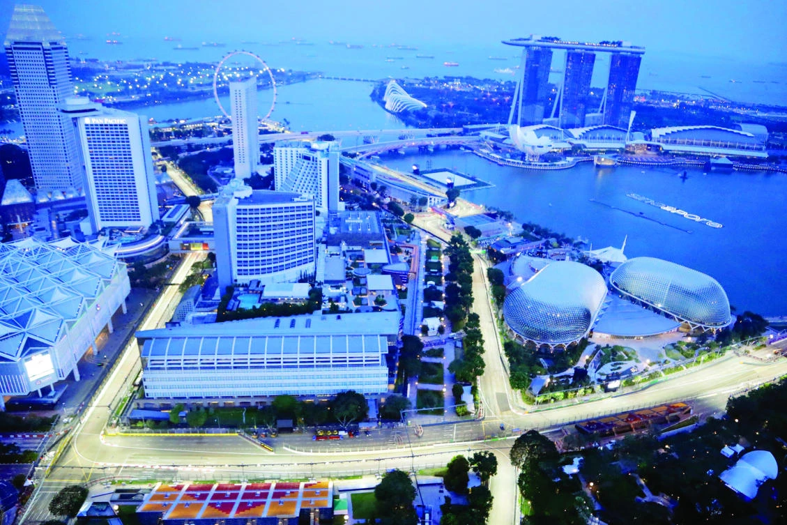 Singapore’s F1 Grand Prix Marina Bay City Circuit is seen lit at dusk
on Thursday. (AP)