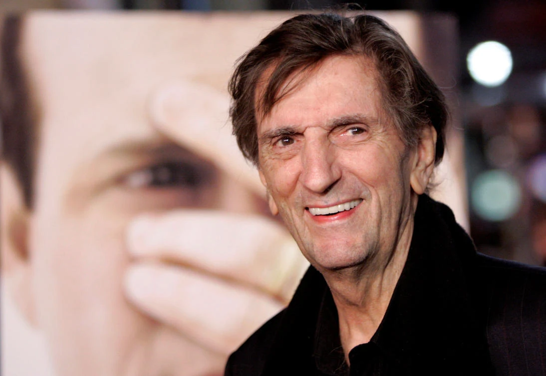 Cast member Harry Dean Stanton smiles at the premiere of "Big Love" at the Grauman's Chinese theatre in Hollywood, California, U.S. on February 23, 2006. (REUTERS)