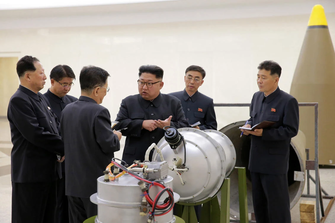 In this undated file image distributed on Sunday, Sept. 3, 2017, by the North Korean government, shows North Korean leader Kim Jong Un at an undisclosed location. (Korean Central News Agency/Korea News Service via AP)