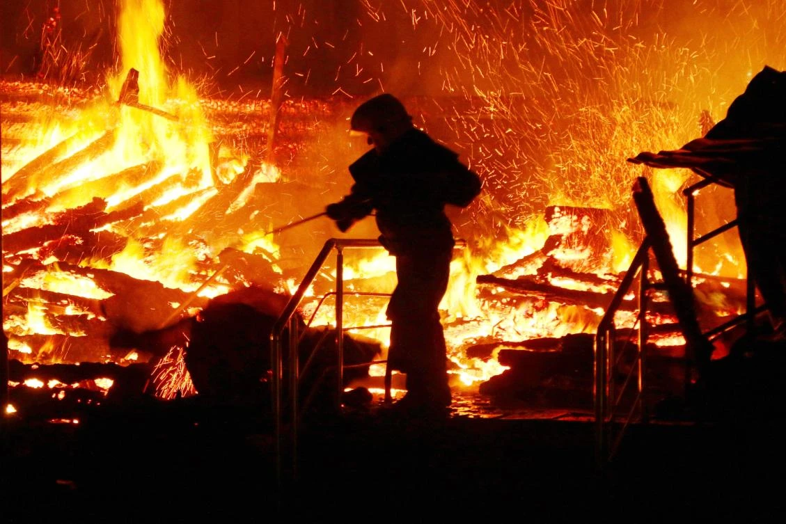Firefighters work to extinguish a fire at a children’s camp in Odessa on September 16, 2017. (AFP)