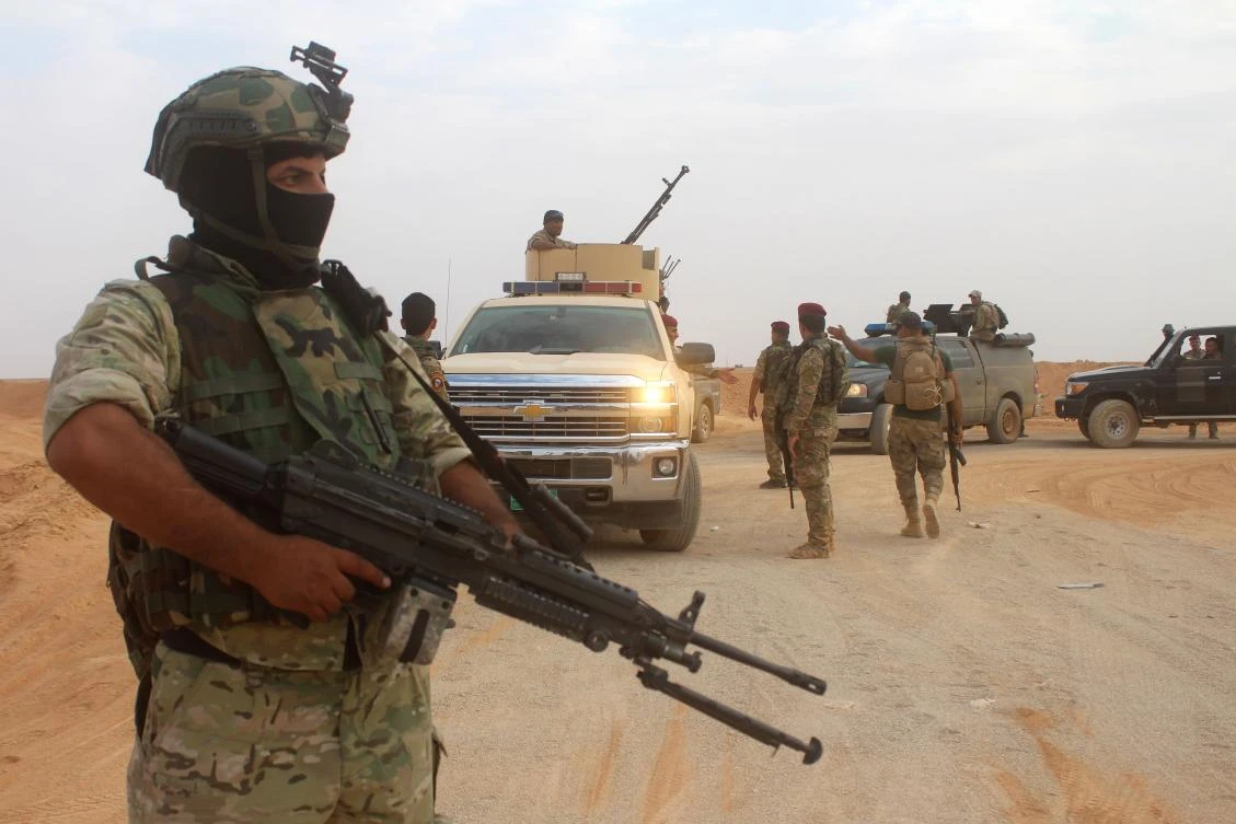 Iraqi forces are seen outside the town of Akashat, northwest of the Al-Anbar province, as they prepare a military operation to push out Daesh group militants from the nearby areas, on September 15, 2017. (File photo by AFP)