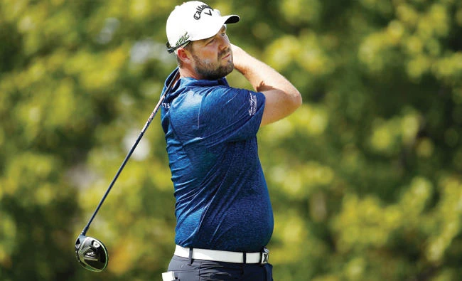 Marc Leishman of Australia hits his tee shot on the fourth hole during the second round of the BMW Championship at Conway Farms Golf Club on Friday in Lake Forest, Illinois. (AFP)