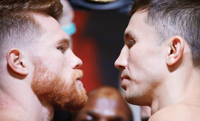 Canelo Alvarez, left, and Gennady Golovkin pose during a weigh-in Friday in Las Vegas. The two are scheduled to fight in a middleweight title bout Saturday. (AP)